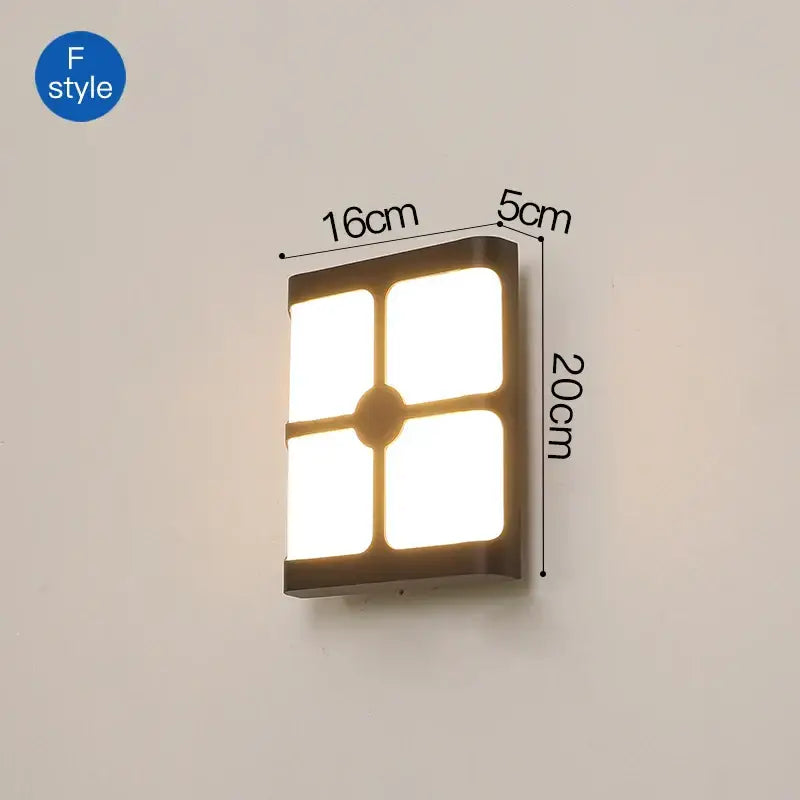DecorBites™ led outdoor wall sconce light with dark bronze finish and four illuminated panels for outdoor wall use