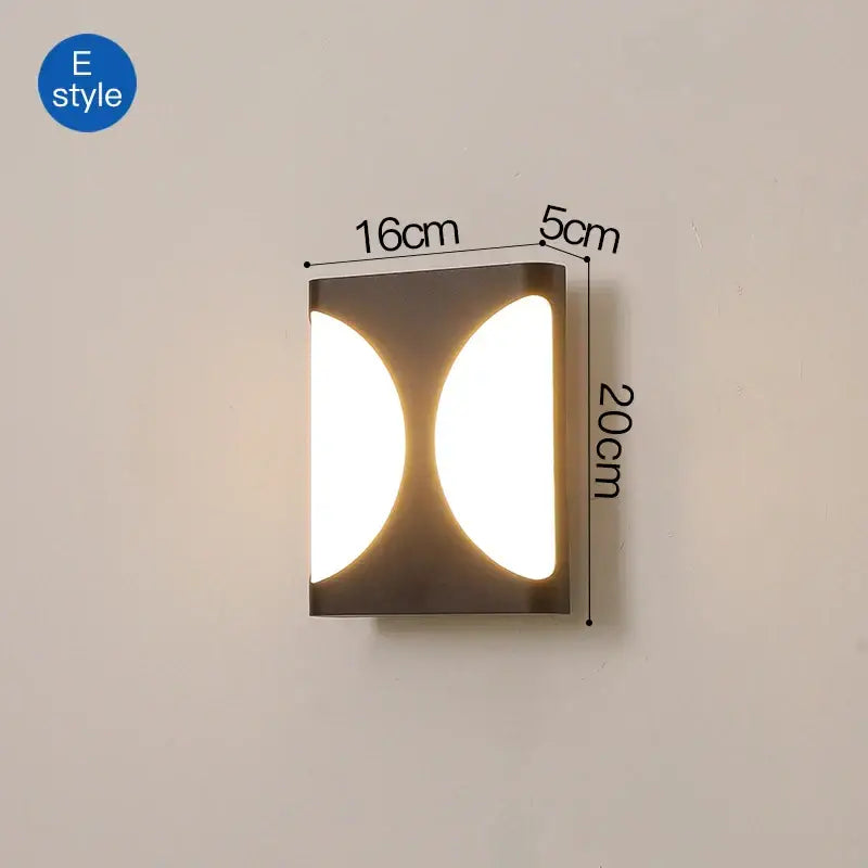 Modern minimalist decorbites led outdoor wall sconce with metallic finish and two illuminated oval panels for outdoor wall use