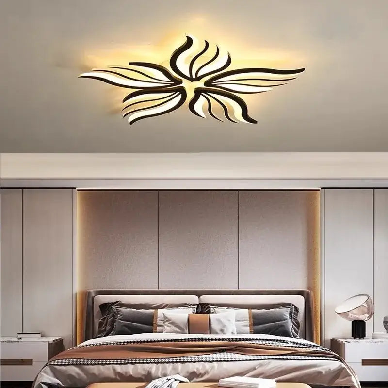 Modern black and white leaf-shaped decorbites led panel ceiling light emitting warm glow for bedroom and living room