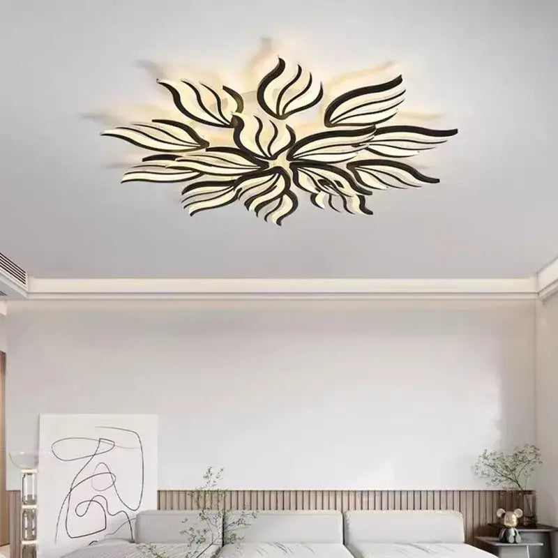 Modern black and white leaf-shaped decorbites led panel ceiling light with sleek minimalist design for living spaces