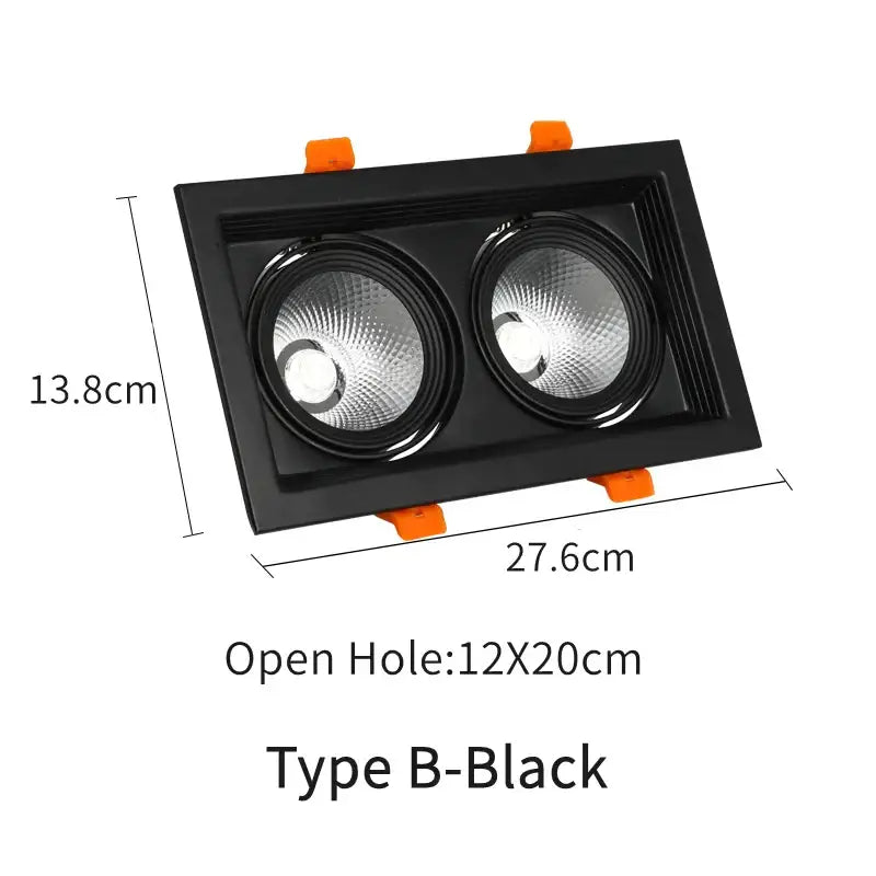 Black rectangular recessed led panel lamp with two circular leds and orange mounting clips for bathroom lighting