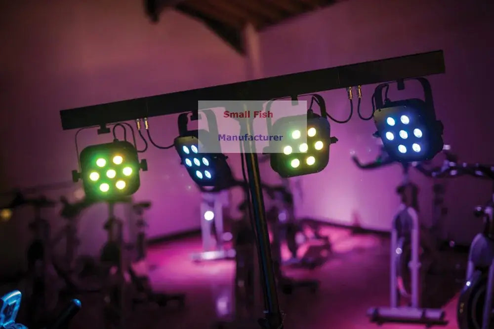 Three illuminated decorbites led par lights emitting green blue and yellow with circular bulb grid pattern in led par kit