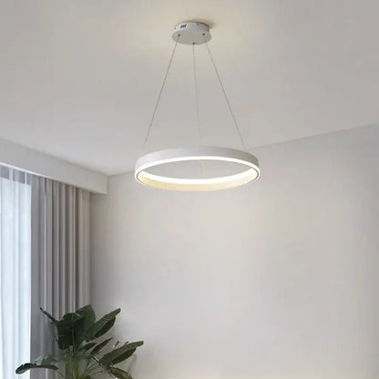 Modern white circular led pendant lamp with sleek minimalist design by decorbites for bedroom kitchen and foyer lighting
