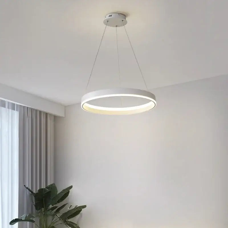 Modern white circular led pendant lamp with sleek minimalist design by decorbites for bedroom kitchen and foyer lighting
