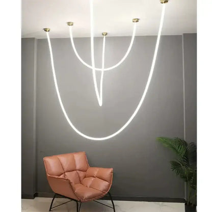 Modern white decorbites led pendant lamp with curved glowing lines and gold fixtures for living and dining rooms