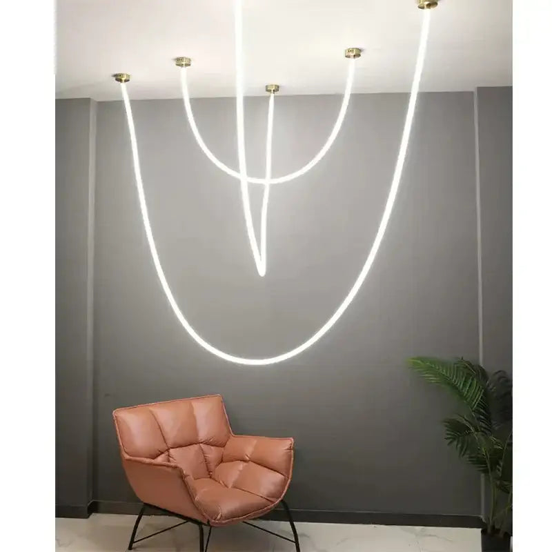 Modern white decorbites led pendant lamp with curved glowing lines and gold fixtures for living and dining rooms