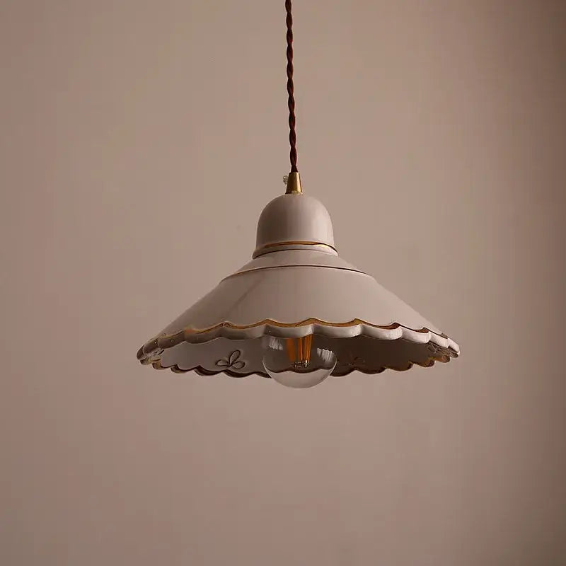 White ceramic pendant lamp with scalloped edge gold trim and exposed bulb by DecorBites led pendant lamp