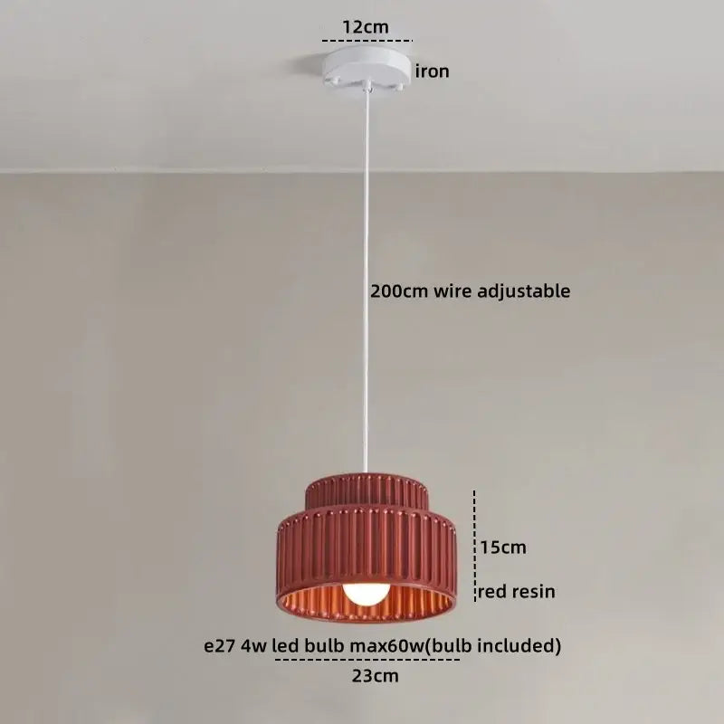 Red resin decorbites led pendant lamp with tiered ribbed design and iron ceiling mount in cream color