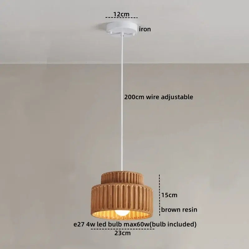 Cream color decorbites led pendant lamp with brown resin tiered ribbed design and white iron ceiling mount