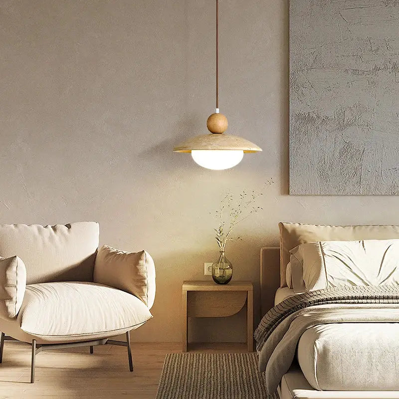 Minimalist decorbites led pendant lamp with warm diffused glow and natural wood-toned disc shade on slender cord