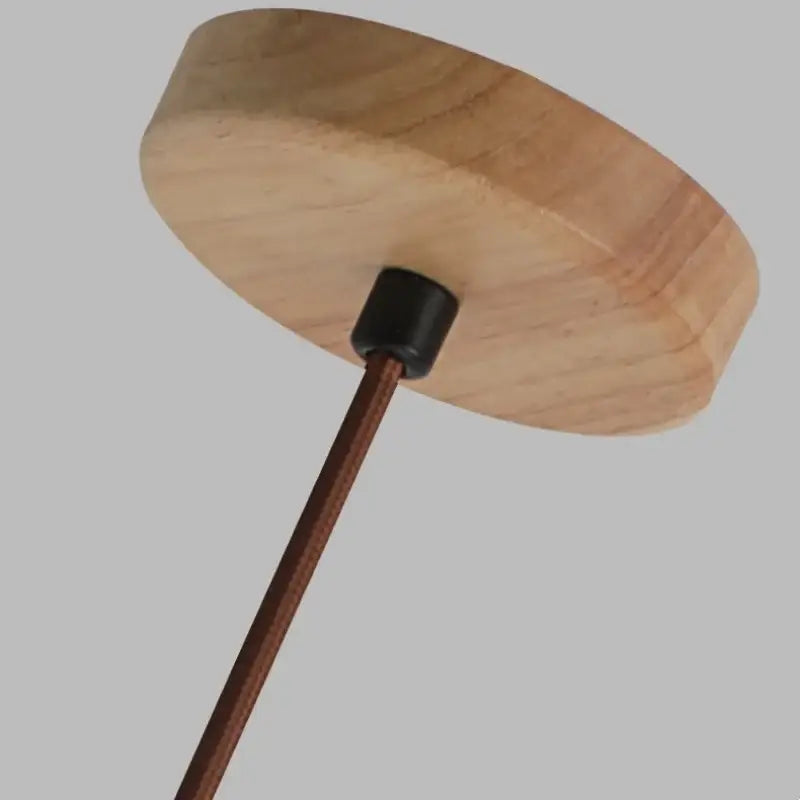 Lightweight decorbites led pendant lamp with natural wood canopy and dark brown metal rod for kitchen or bedroom lighting
