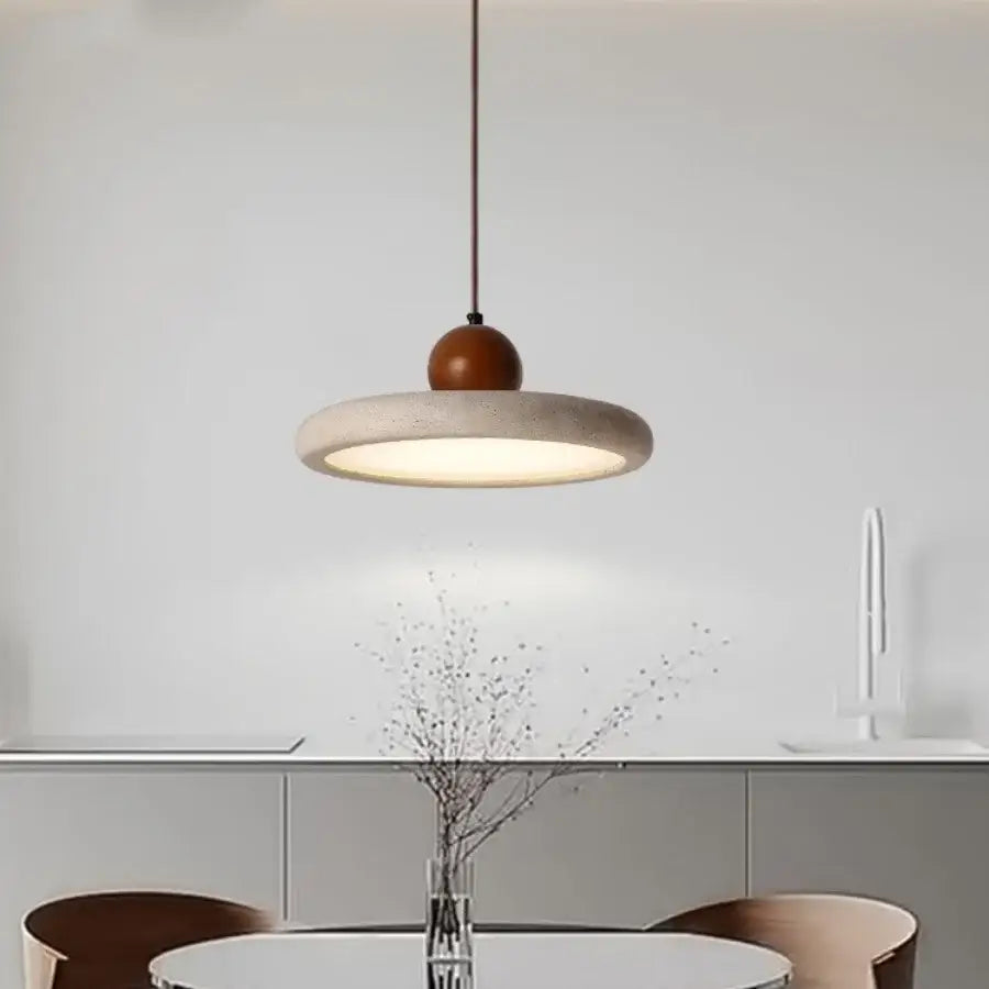 Minimalist decorbites led pendant lamp with warm wooden globe and textured yellow stone concrete disc