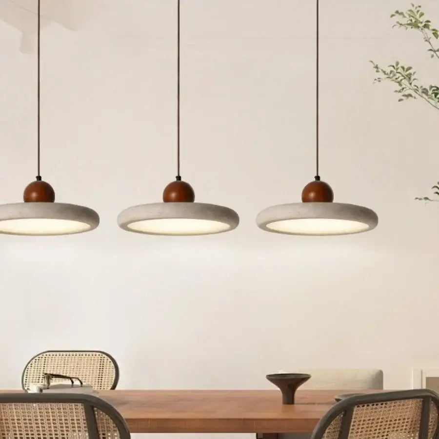 DecorBites led pendant lamp with textured yellow travertine shade, white glass bulb, and copper metal wire suspension