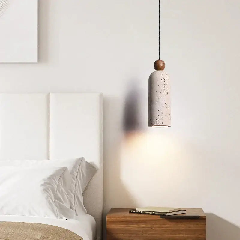 Decorbites led pendant lamp with yellow travertine wood top and speckled beige concrete shade hanging by black cord