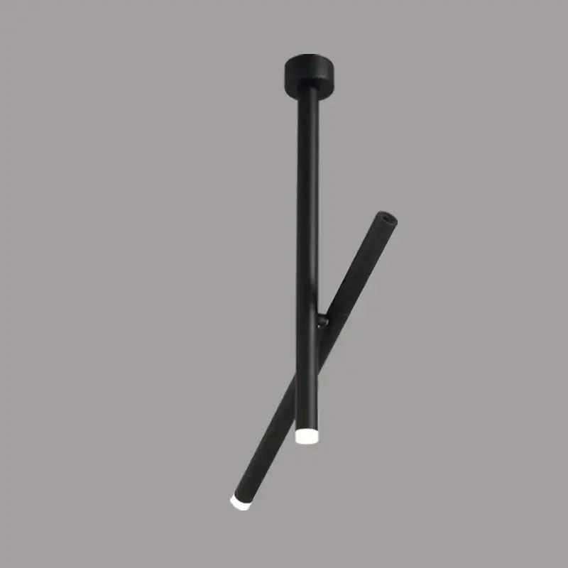 Modern black DecorBites LED pendant light featuring cylindrical design with intersecting rods and illuminated ends for living room