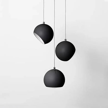 Set of three matte black spherical decorbites led pendant lights with minimalist design for modern interiors