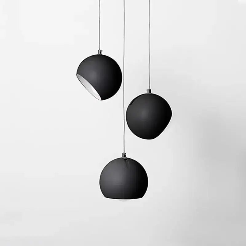 Set of three matte black spherical decorbites led pendant lights with minimalist design for modern interiors
