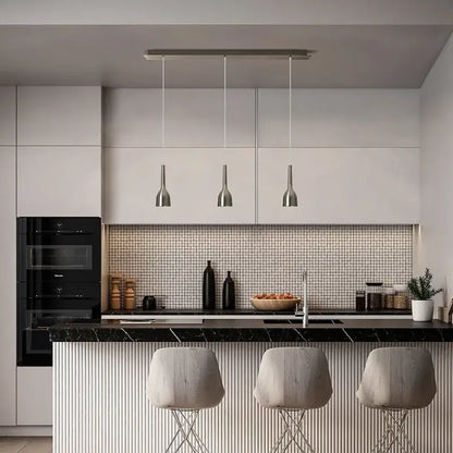 Modern minimalist DecorBites LED pendant lights with brushed nickel finish hang above kitchen island as sleek LED pendant light