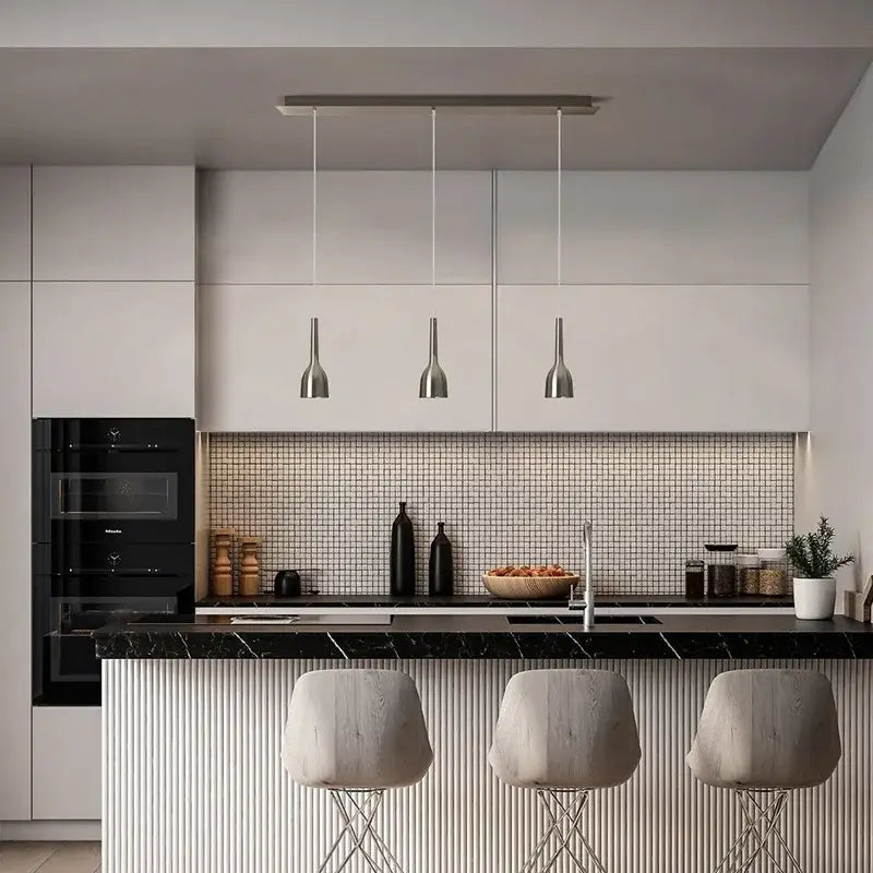 Modern minimalist DecorBites LED pendant lights with brushed nickel finish hang above kitchen island as sleek LED pendant light