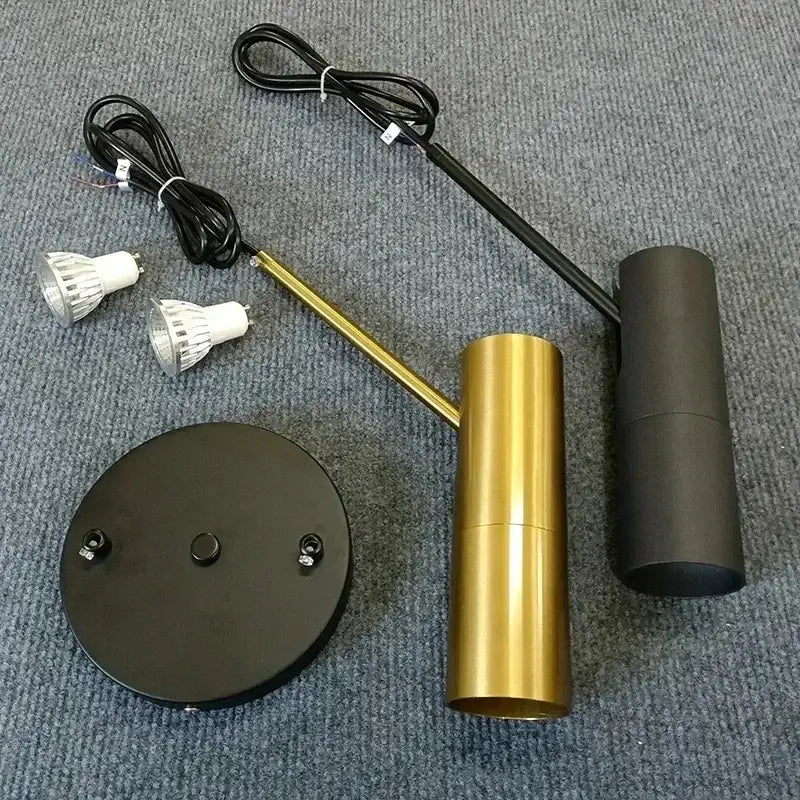Decorbites led pendant light with sleek gold cylindrical shade and black base featuring adjustable arms for versatile lighting