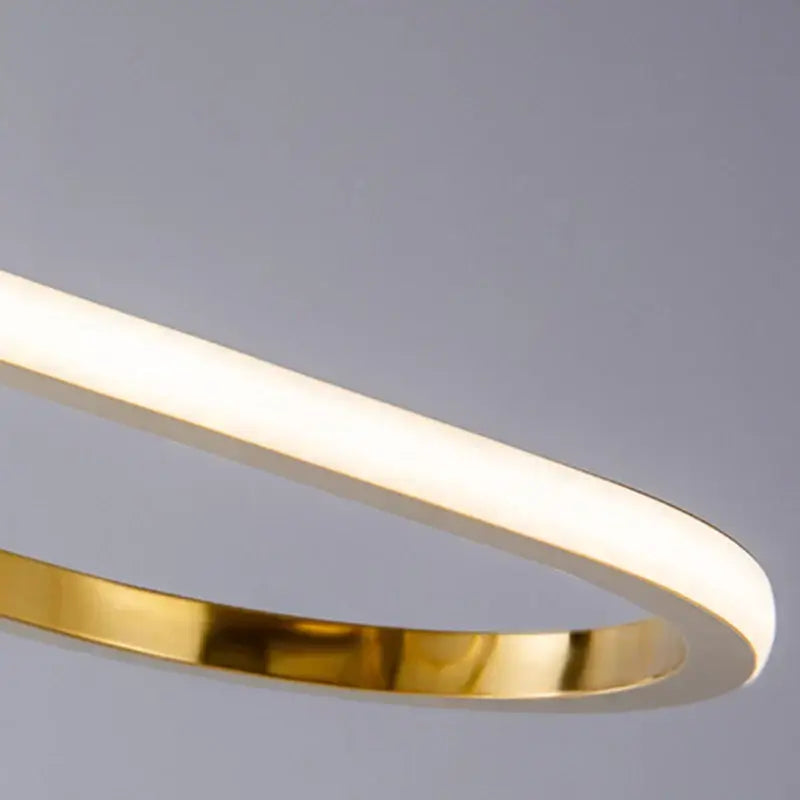 Gold-toned circular decorbites led pendant light chandelier with sleek modern design and softly glowing white illumination