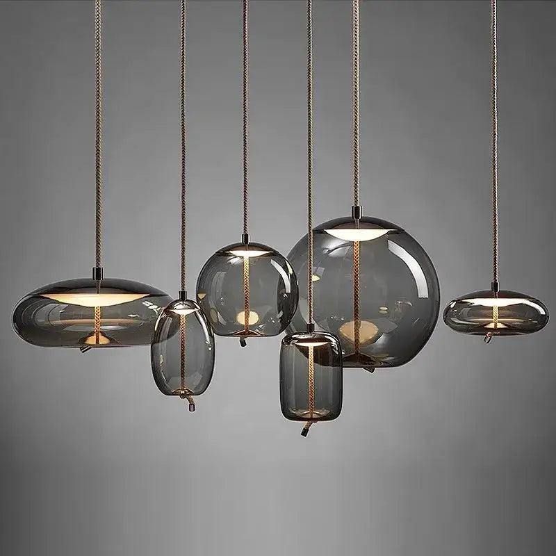 Set of decorbites led pendant light chandelier with smoked glass, brass accents, and braided cords for modern spaces