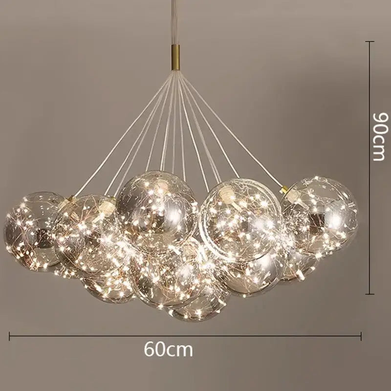 A modern DecorBites led pendant chandelier with transparent glass spheres and internal LED lights for living and dining rooms