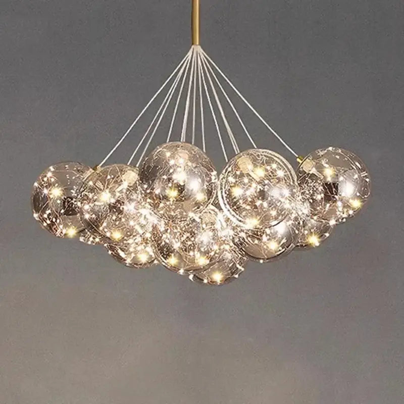Modern glass globe DecorBites led pendant chandelier with warm LED lights and gold-toned rod for living and dining rooms