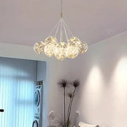 A modern decorbites led pendant chandelier with translucent glass spheres and warm led pendant light for living room decor