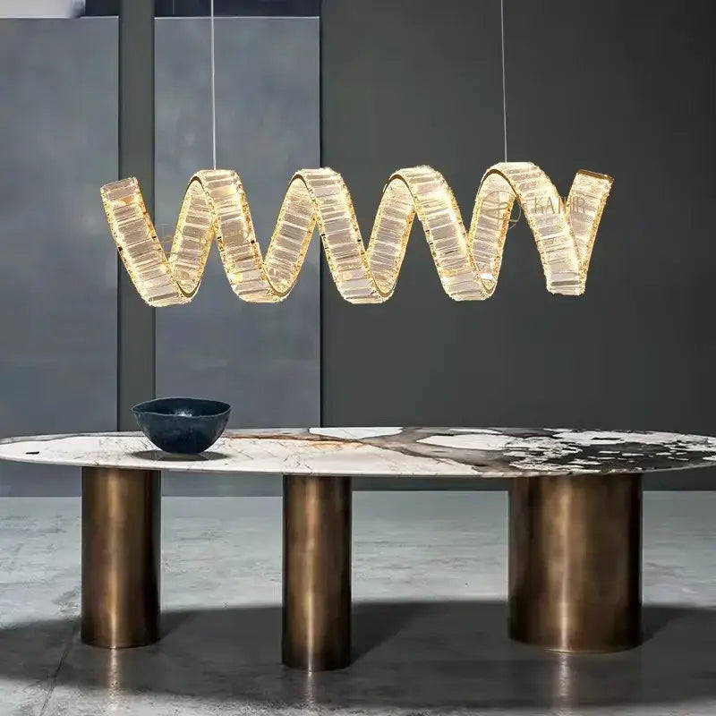 Golden wave-shaped crystal DecorBites LED pendant light chandelier with illuminated LED lighting for living and dining room decor