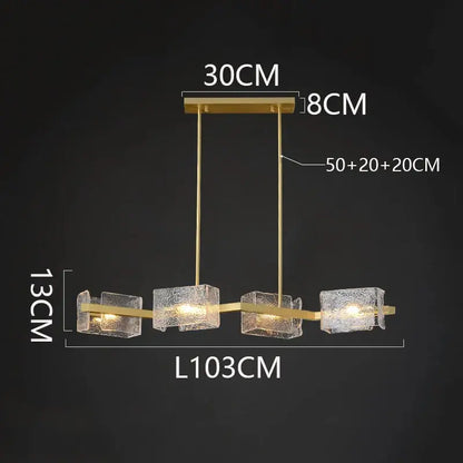 Gold-toned decorbites led pendant light chandelier with four textured glass cubes for indoor living and dining rooms
