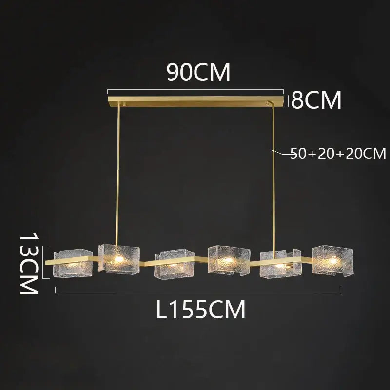Gold-toned decorbites led pendant with five textured glass cubes suspended by slender rods for indoor lighting