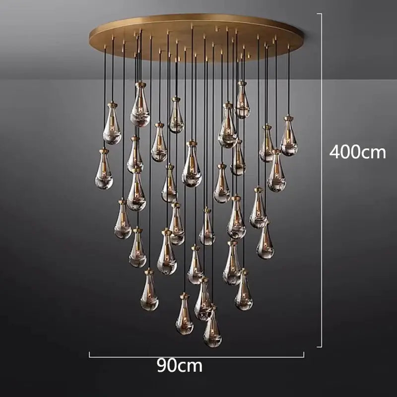 A modern brass circular DecorBites LED pendant light chandelier with teardrop pendant lights for living room lighting