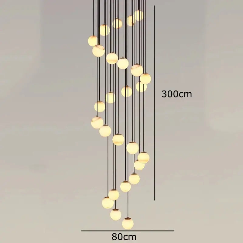 A modern 300cm decorbites led pendant chandelier with spherical glass bulbs on black cords for indoor lighting