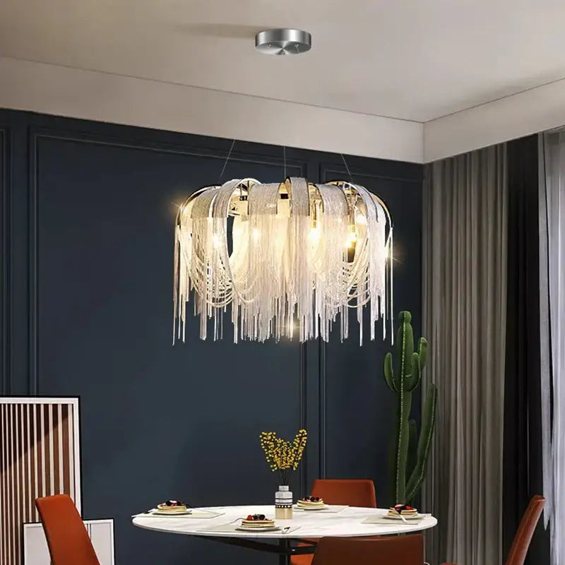 Decorbites led pendant light chandelier with cascading white fringed strands and sleek metallic frame for modern decor