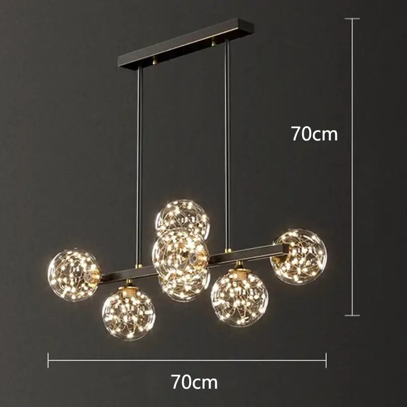 Modern black metal DecorBites led pendant light chandelier with five glowing spherical glass globes and wirework detailing