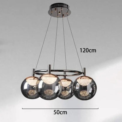 Modern chrome-finished decorbites led pendant light chandelier with four spherical glass globes and golden led lights