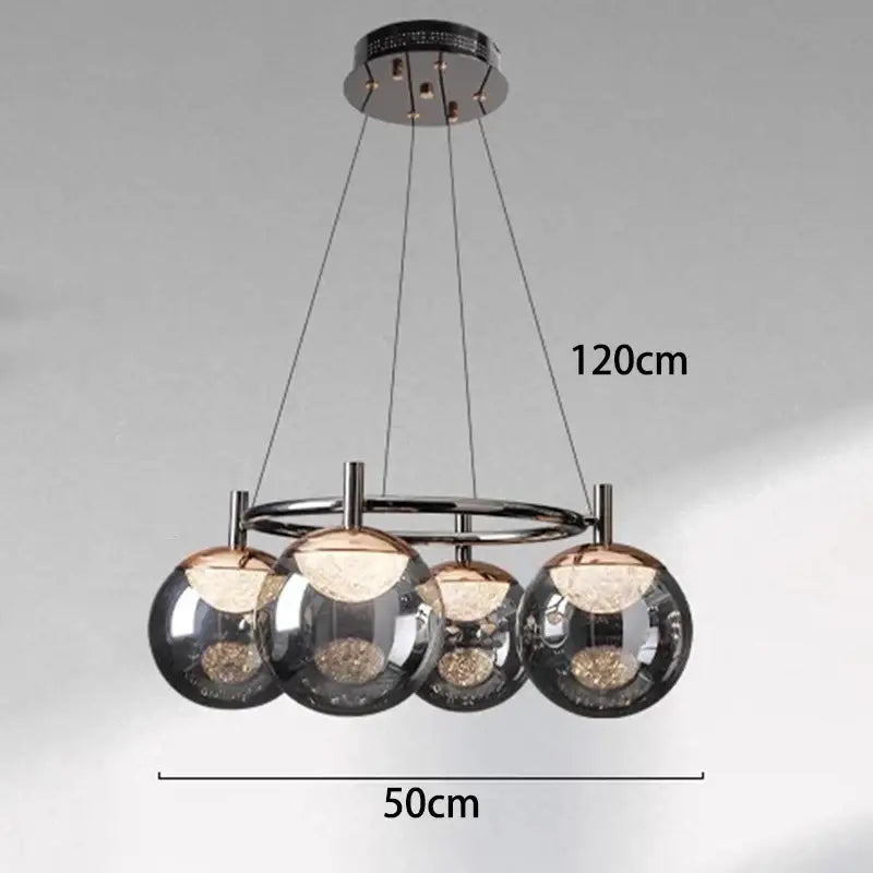 Modern chrome-finished decorbites led pendant light chandelier with four spherical glass globes and golden led lights