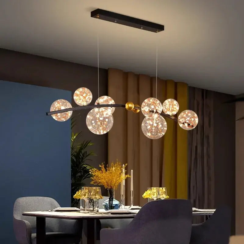 Modern decorbites led pendant light chandelier with black rectangular mount and warm glowing glass globes for indoor use