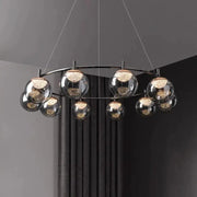 Modern black metal decorbites led pendant chandelier with clear glass spheres and warm-toned led pendant lights for indoor lighting