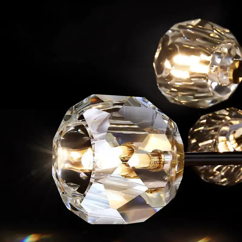 Faceted crystal globe decorbites led pendant lights with warm golden bulbs for modern indoor lighting and decor