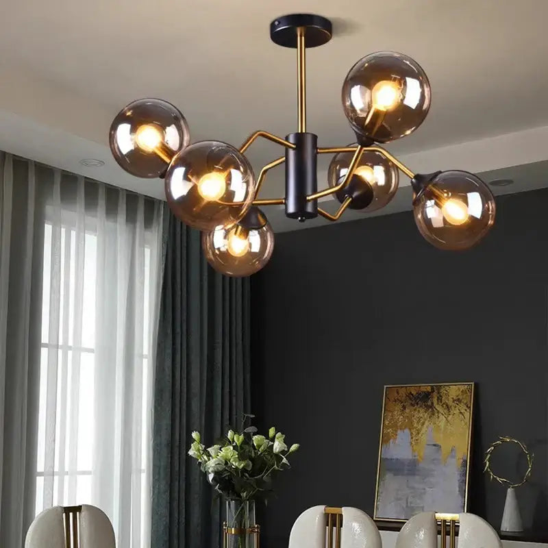 Modern chandelier with six amber glass globes and brass frame from DecorBites led pendant light collection for dining rooms