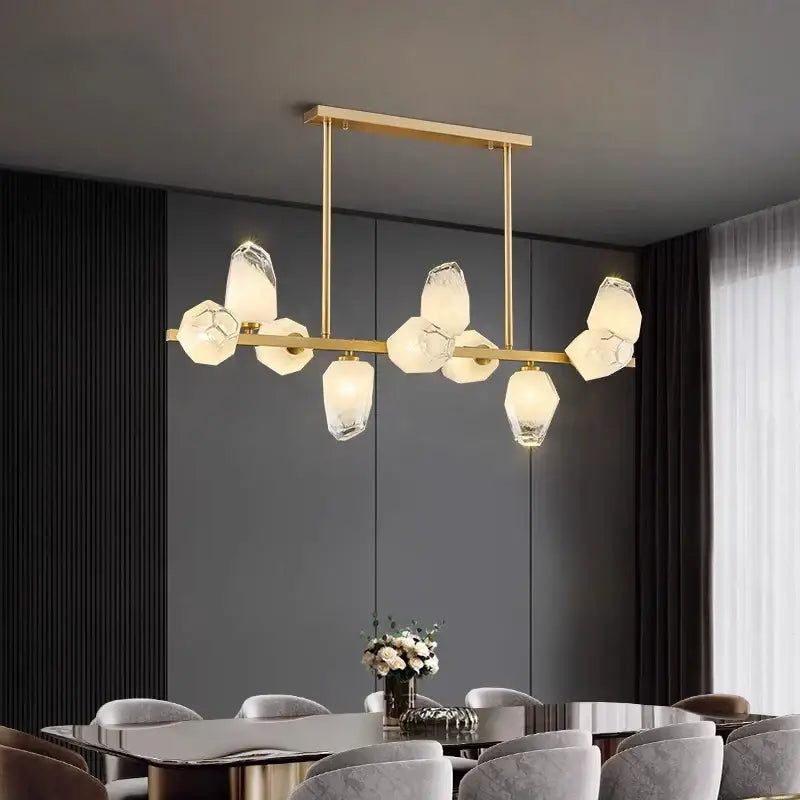 Gold-toned decorbites led pendant light chandelier with faceted translucent glass shades for modern decor lighting