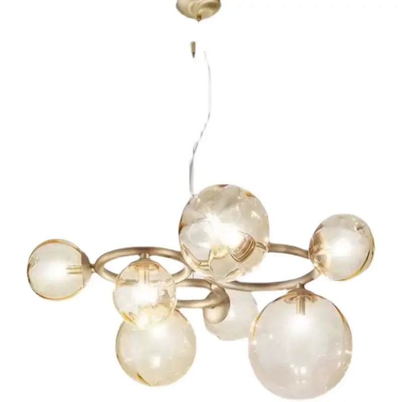 A decorbites led pendant chandelier featuring amber glass spheres and a brass frame for modern indoor lighting pendant lights