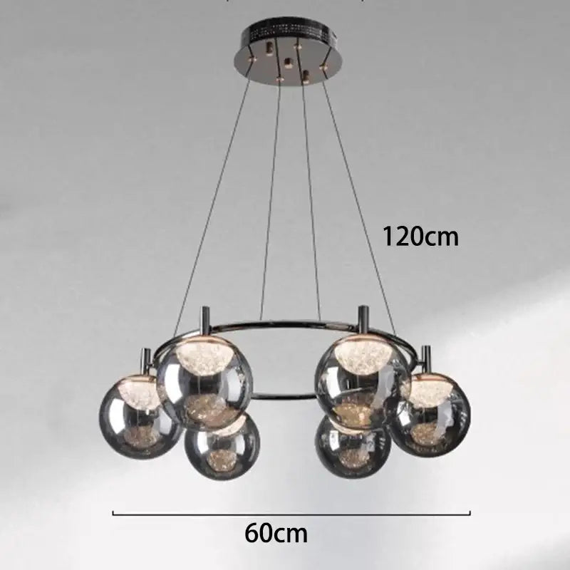 Modern chrome finished decorbites led pendant with five reflective glass spheres for indoor lighting and home decor