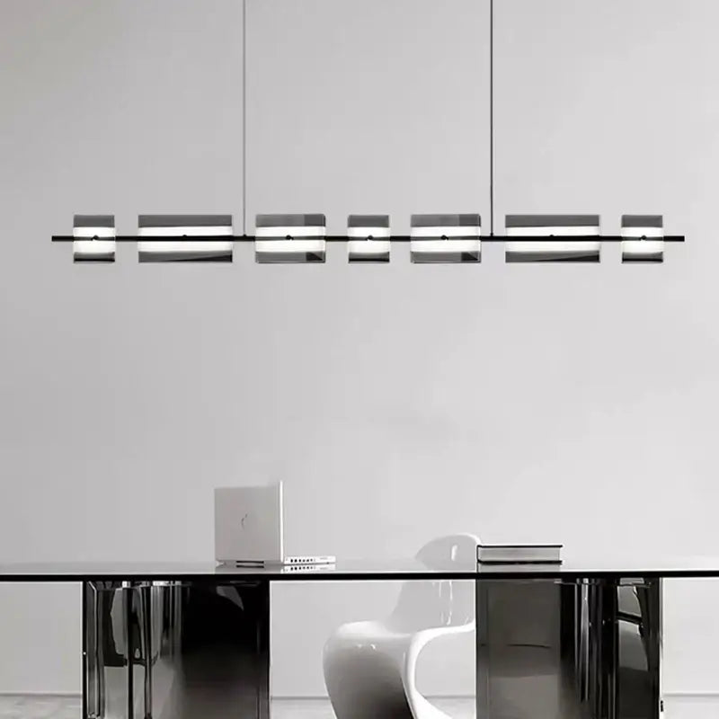 Modern minimalist decorbites led pendant lights with sleek black metal frame and translucent glass for indoor lighting