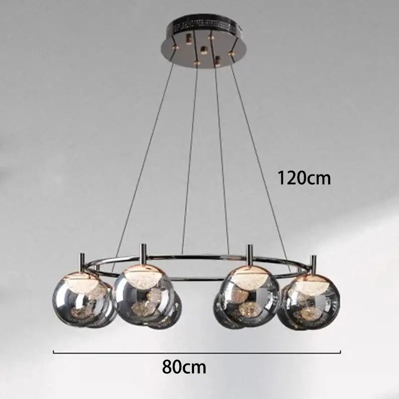 Modern chrome-finished DecorBites LED pendant light with five reflective glass globe shades for indoor lighting