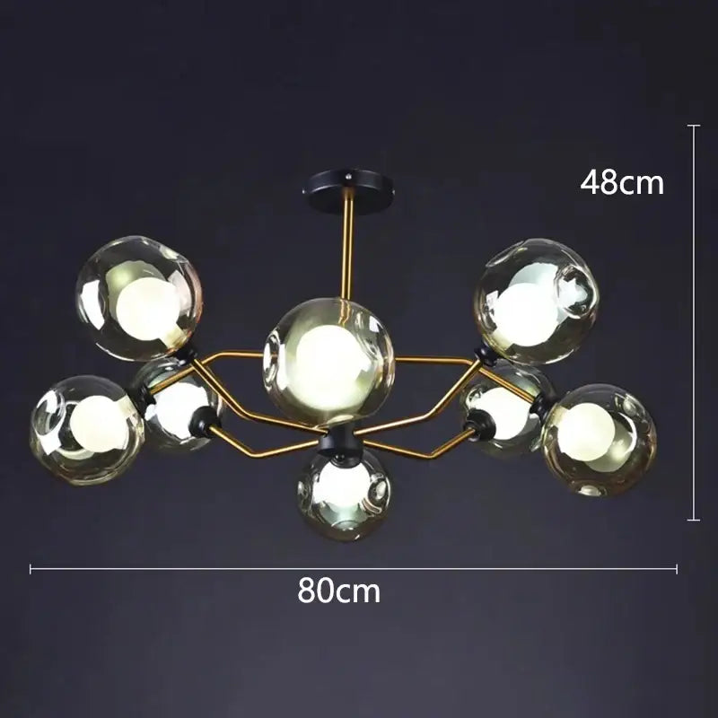 Modern brass-toned decorbites led pendant light chandelier with seven reflective glass globe bulbs in geometric design