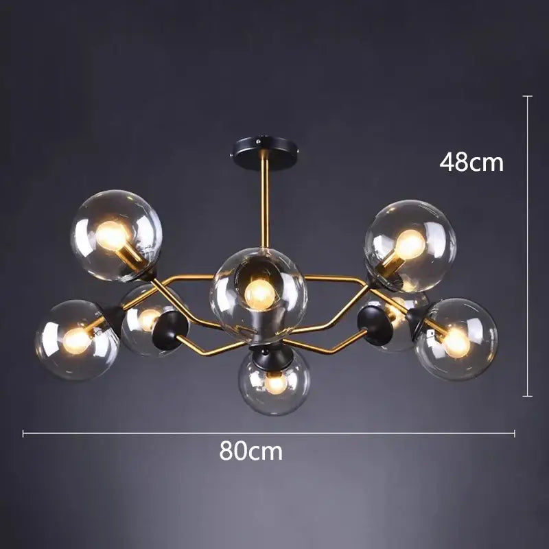 Modern brass and black decorbites led pendant lights with clear glass globe bulbs for dining room lighting