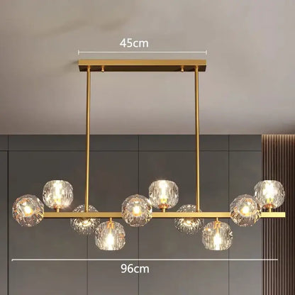 Gold-toned decorbites led pendant chandelier with multiple faceted crystal globe lights for modern indoor lighting